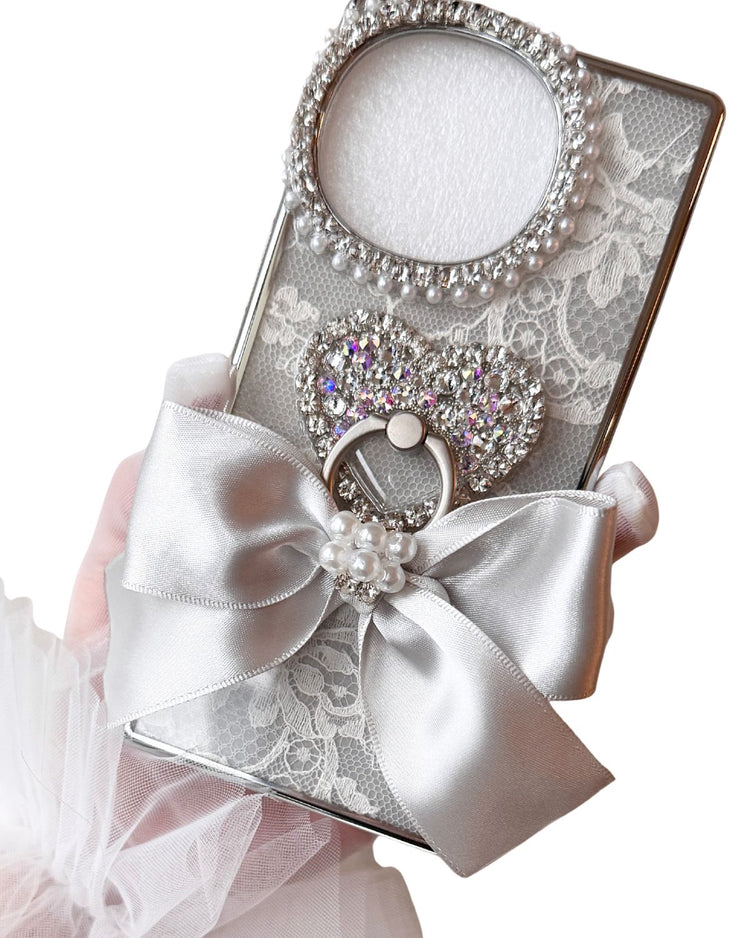 Hime. フランス製レースリングリボン iPhoneケース｜キラキラ×スワロフスキーハートリング（全機種Android対応）